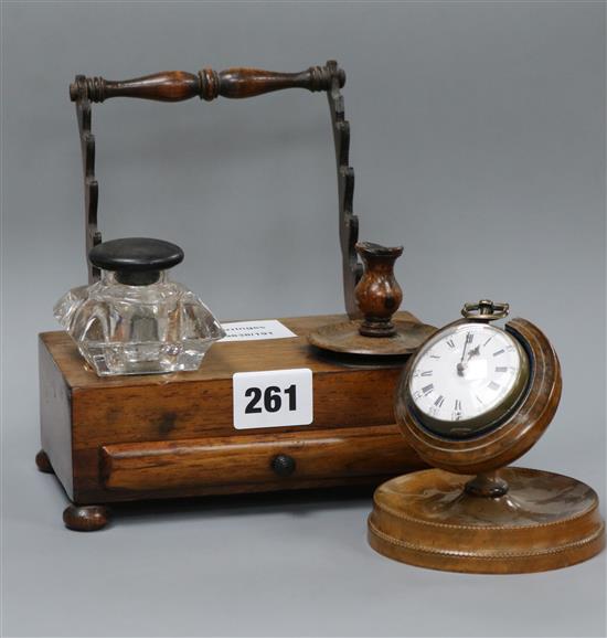 A 19th century treen pocket watch holder with late 18th century brass cased verge pocket watch and a Victorian